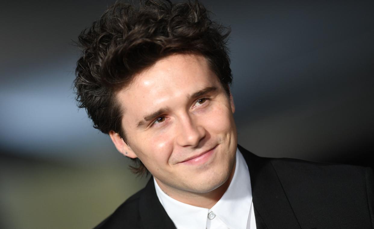 English model Brooklyn Beckham arrives for the 2nd Annual Academy Museum Gala at the Academy Museum of Motion Pictures in Los Angeles, October 15, 2022. (Photo by VALERIE MACON / AFP) (Photo by VALERIE MACON/AFP via Getty Images)