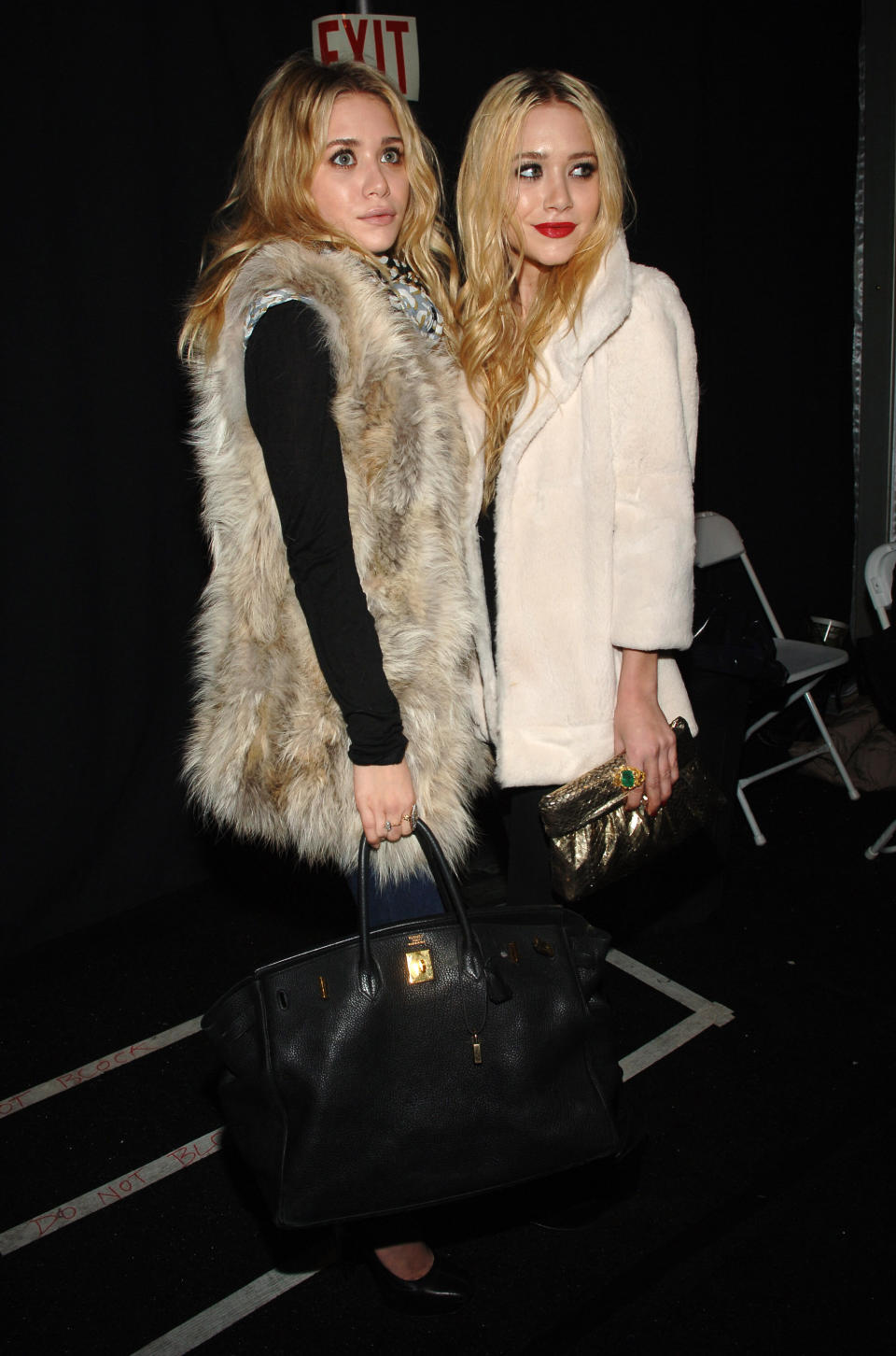 Mary-Kate and Ashley attend Mercedes Benz Fashion Week in New York.