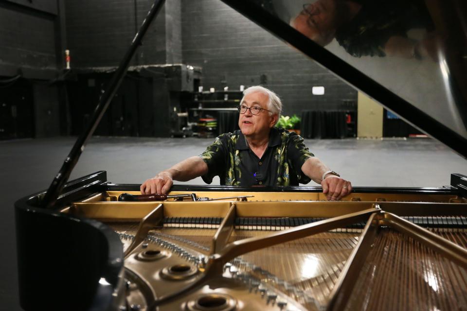 Charles Ball, the Austin Symphony's piano tuner for the past 40 years, demonstrates how he tunes pianos on Aug. 9 at the Long Center for the Performing Arts. Ball has retired from his work with the symphony and decades of leading the piano tuning team at the University of Texas.