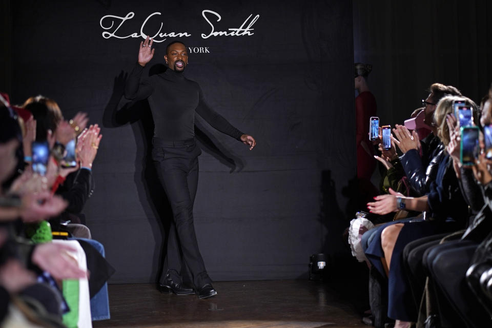 LaQuan Smith walks the runway after showing his Fall/Winter 2022 collection at 60 Pine Street during New York Fashion Week on Monday, Feb. 14, 2022, in New York. (Photo by Charles Sykes/Invision/AP)