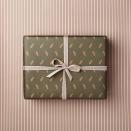 <p>Printed on 100% recycled paper, this wrapping paper also offers two designs in one – delicate gold spruce leaves on a deep forest green on one side, contrasting stripes on the other. It’s stylish mixing and matching made easy. £5 for two sheets, <a href="https://katieleamon.com/p/spruce-stripe-double-sided-eco-gift-wrap/" rel="nofollow noopener" target="_blank" data-ylk="slk:katieleamon.com;elm:context_link;itc:0;sec:content-canvas" class="link ">katieleamon.com</a></p>