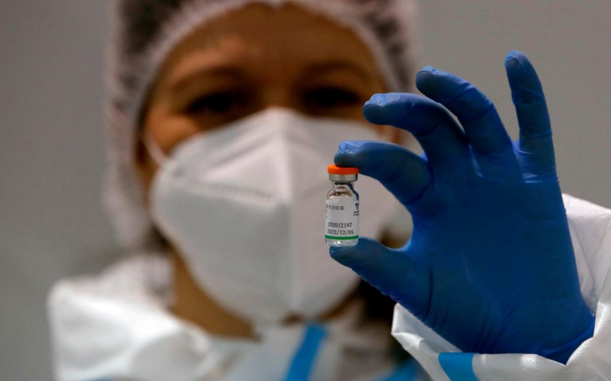 The World Health Organization has given the Chinese vaccine the green light for use around the world  - AP /Darko Vojinovic