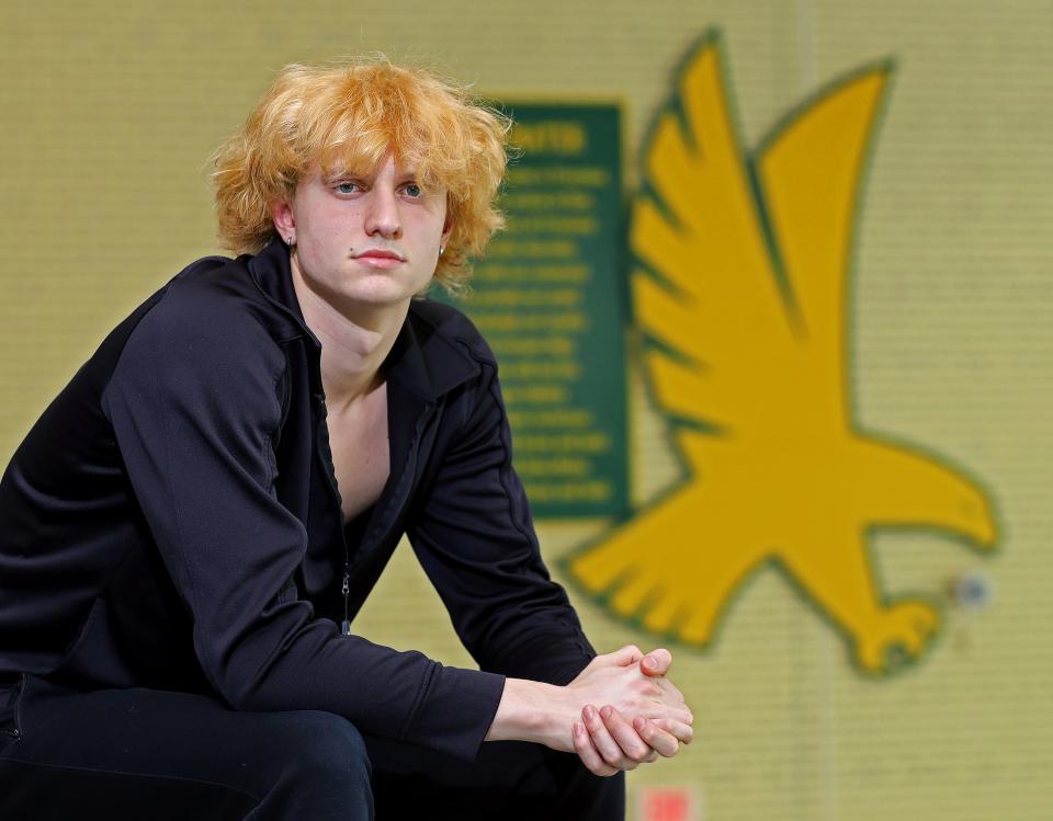 Firestone senior swimmer Jonny Marshall poses for a portrait before a meet Jan. 24 at Firestone High School.