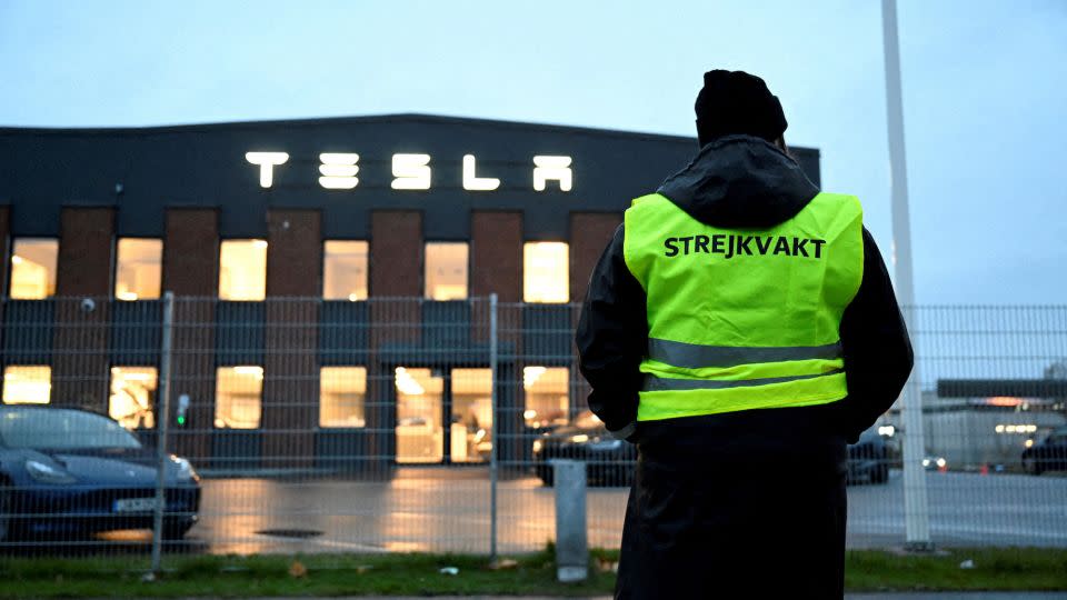 Emma Hansson, an IF Metall executive, stands on strike outside Tesla's service center in Stockholm, Sweden, on October 27. - Jessica Gow/TT News Agency/Reuters