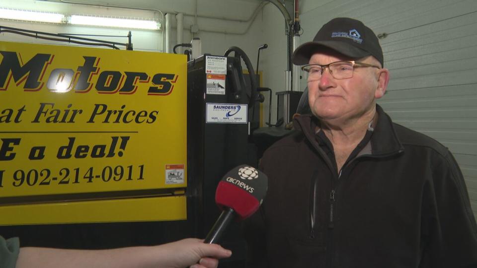 Billy Keough has been taking care of the ice at Tignish's Credit Union Arena for the past 26 years. The crew at the rink recently threw him an 80th birthday party. (Stacey Janzer/CBC - image credit)
