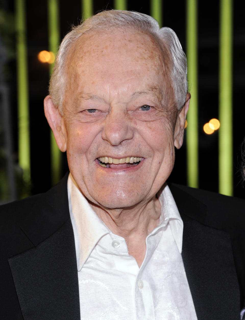 FILE - In this Nov. 8, 2011, file photo, Bob Schieffer arrives at the 59th Annual BMI Country Awards in Nashville. Beneath Schieffer's Southern charm is the tough spine of someone used to dealing with politicians. The moderator of Monday's final presidential debate will need it, because it has been open season on the other journalists who have done that job this campaign. Thanks to a bitter campaign rivalry, thriving partisan media outlets and the growth of social media, debate moderator is approaching baseball umpire on the scale of thankless jobs. (AP Photo/Evan Agostini, File)