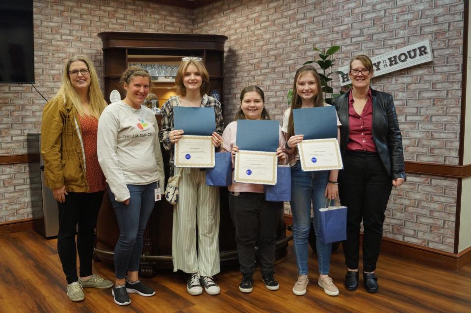 Carolyn Labay, left, BPW President Rachael Yoder, Alexis Sheppard, Brooklyn Martin, Sydney Spellman and Lori Marsh-Lykins attended the Ashland Business and Professional Women's March meeting where students gave presentations on historic women.