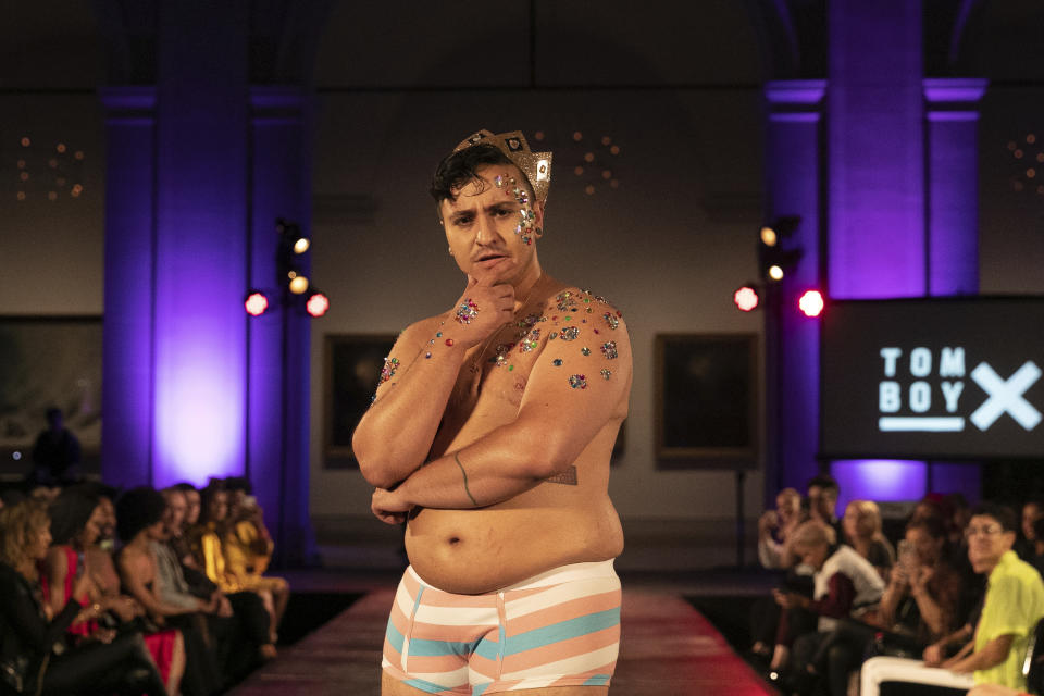 Actor Zach Barack walks on the runway during the Tomboy X presentation at the dapperQ fashion show at the Brooklyn Museum on Thursday, Sept. 5, 2019, in New York. (AP Photo/Jeenah Moon)