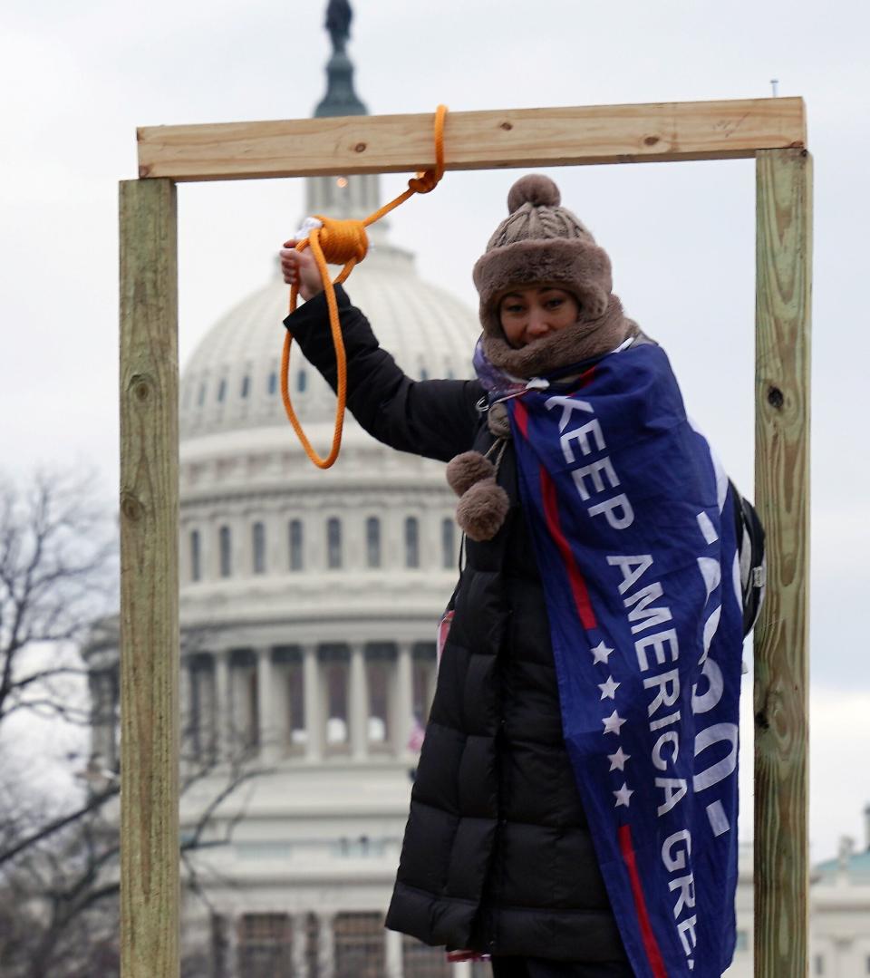 A supporter of President Donald Trump holds a noose outside the U.S. Capitol Building in Washington, D.C., on Wednesday. (Photo: Trevor Hughes/USA TODAY/Reuters)