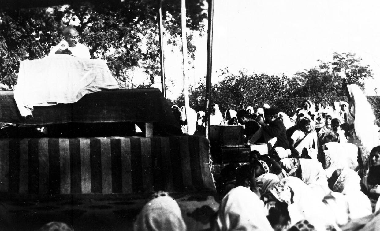 Mohandas Gandhi, who led India's fight for independence, talks to a crowd in Ahmedabad, India in 1931. AP