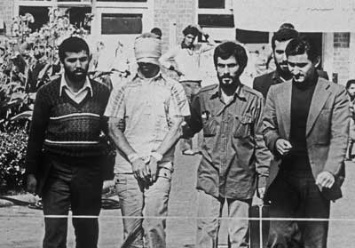 <b>An American hostage is shown at the U.S. embassy in Tehran.</b> Photo MPI/<a class="link " href="http://www.gettyimages.com" rel="nofollow noopener" target="_blank" data-ylk="slk:Getty Images;elm:context_link;itc:0;sec:content-canvas">Getty Images</a>