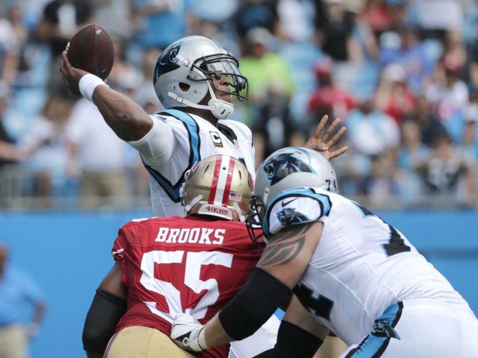 <p>Carolina Panthers’ Cam Newton (1) looks to pass under pressure from San Francisco 49ers’ Ahmad Brooks (55) in the first quarter of an NFL football game in Charlotte, N.C., Sunday, Sept. 18, 2016. (AP Photo/Chuck Burton) </p>