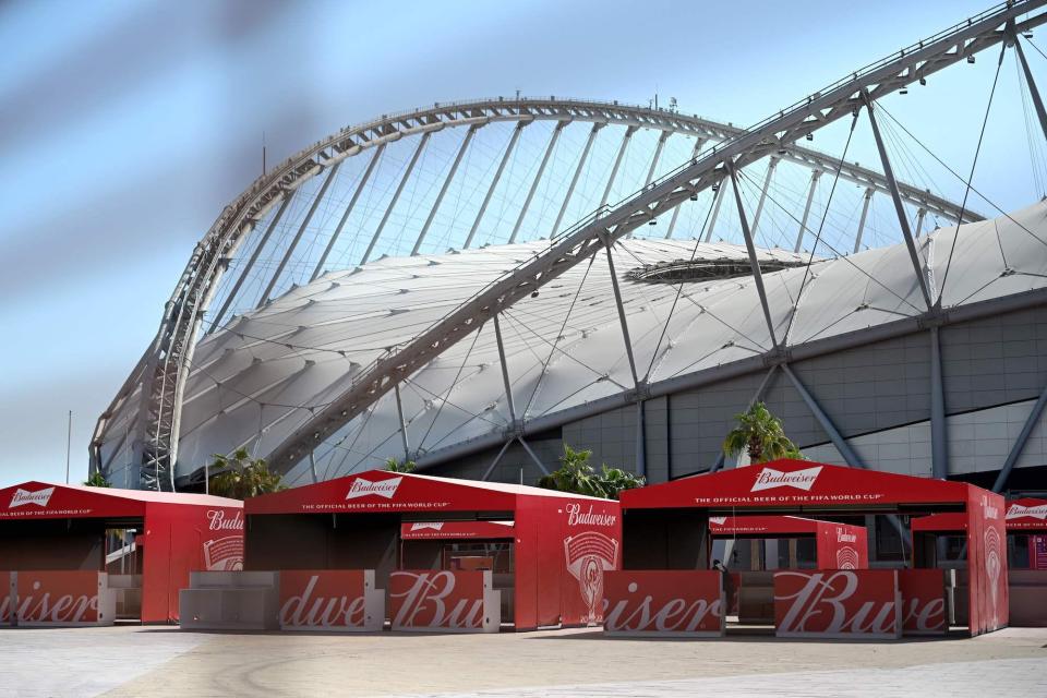 Budweiser beer kiosks are pictured at the Khalifa International Stadium in Doha on November 18, 2022, ahead of the Qatar 2022 World Cup football tournament.