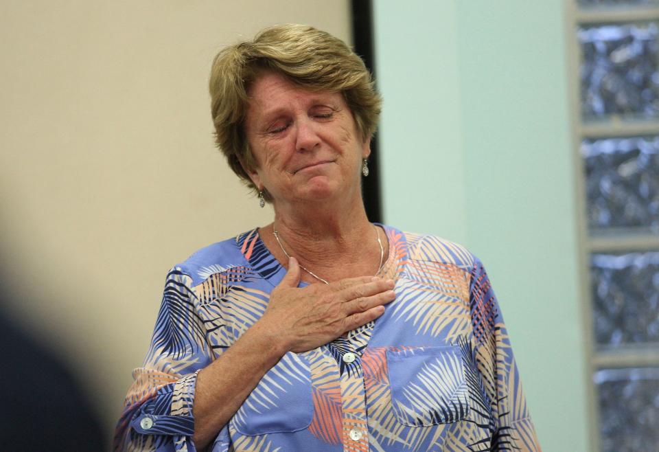 Indian River School Board member Peggy Jones speaks during a town hall meeting in Gifford at the Gifford Community Center ion July 31, 2023. “Can you imagine an African American middle school student sitting in a classroom and seeing there is a benefit of slavery?” Jones said while holding back tears. “Can you imagine an African American teacher having to teach that?”