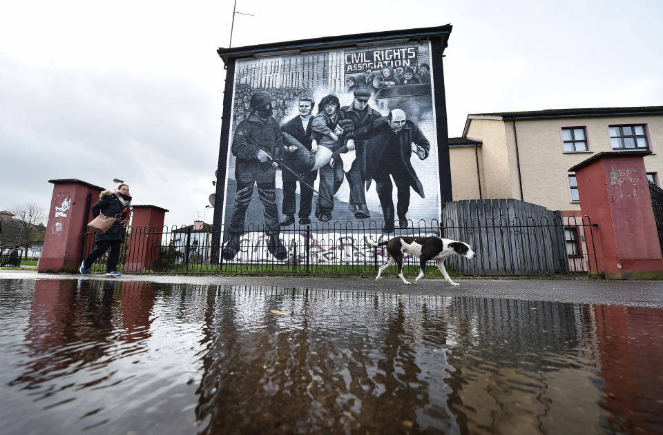 LONDONDERRY, NORTHERN IRELAND - MARCH 13: The Bloody Sunday mural depicting the body of Jackie Duddy being carried away after his shooting alongside Bishop Edward Daly is seen in the Rossville Street area where soldiers opened fire on civil rights marchers on March 13, 2019 in Londonderry, Northern Ireland. On Thursday the Public Prosecution Service will announce whether or not the soldiers accused of murdering the civilians killed on Bloody Sunday will face prosecution. Members of the British Army Parachute Regiment 1st Battalion, which had been sent into Derrys Bogside on 30 January 1972, shot dead 14 unarmed civilians taking part in a civil rights demonstration in what became known as Bloody Sunday. (Photo by Charles McQuillan/Getty Images)