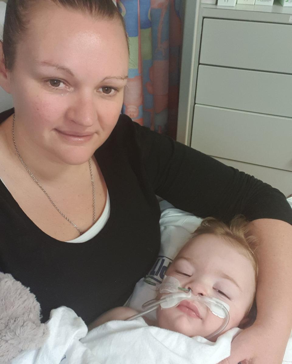 Wellington mum Abby Wilton with her 18-month-old son in hospital.