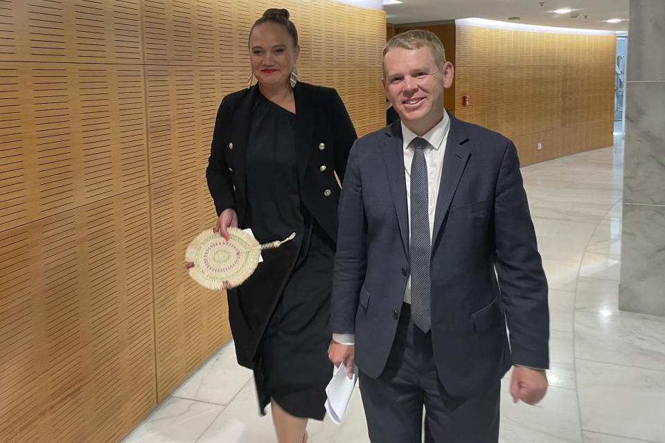 Chris Hipkins, right, and Carmel Sepuloni arrive for a press conference at Parliament in Wellington, Sunday, Jan. 22, 2023. Hipkins was confirmed Sunday as New Zealand's next prime minister and he chose Sepuloni as his deputy, marking the first time a person with Pacific Island heritage has risen to that rank. (AP Photo/Nick Perry)