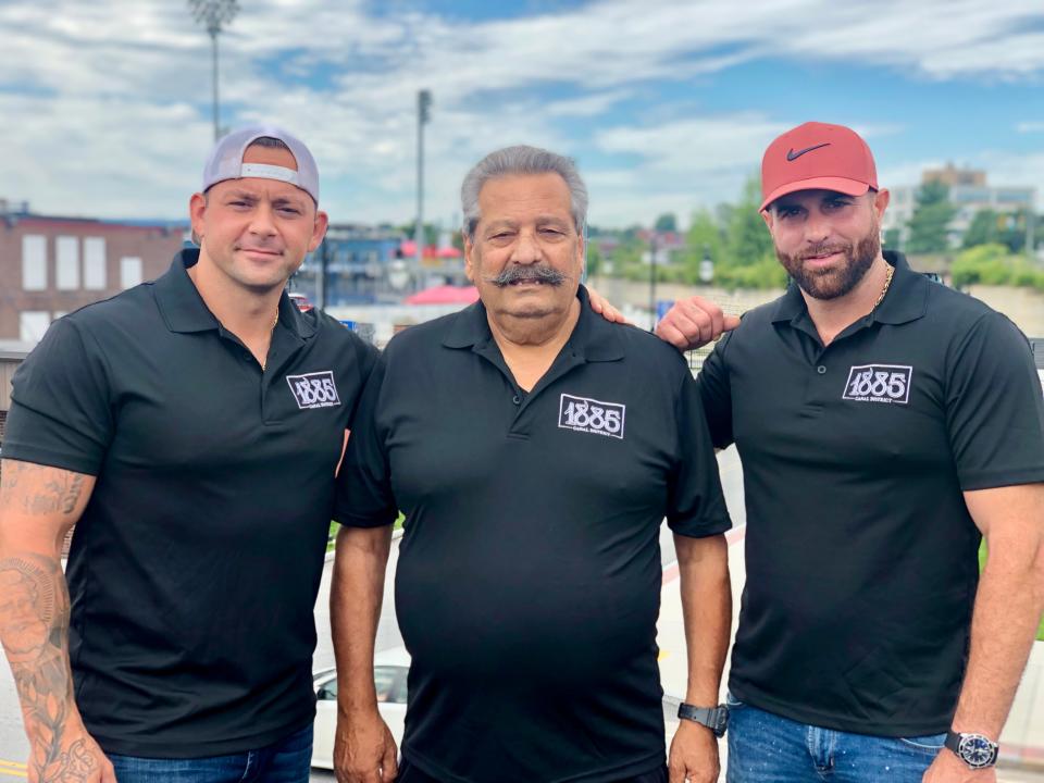 The owners of 1885, a new bar opening in the Canal District this fall, hope to reinvent our idea of the neighborhood bar, are, from left Cameron Brigham, Mario Ritacco, and Nick Oliveri.