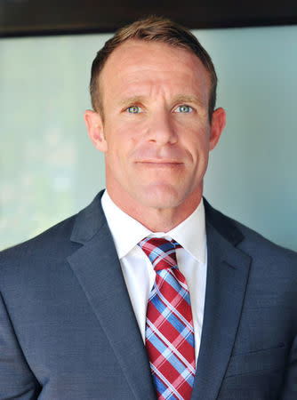 U.S. Navy SEAL Special Operations Chief Edward Gallagher, charged with war crimes in Iraq, is shown in this undated photo provided May 24, 2019. Courtesy Andrea Gallagher/Handout via REUTERS