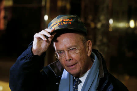 FILE PHOTO: Billionaire investor Wilbur Ross, chairman of Invesco Ltd subsidiary WL Ross & Co, departs Trump Tower after a meeting with U.S. President-elect Donald Trump in New York, U.S., November 29, 2016. REUTERS/Lucas Jackson/File Photo