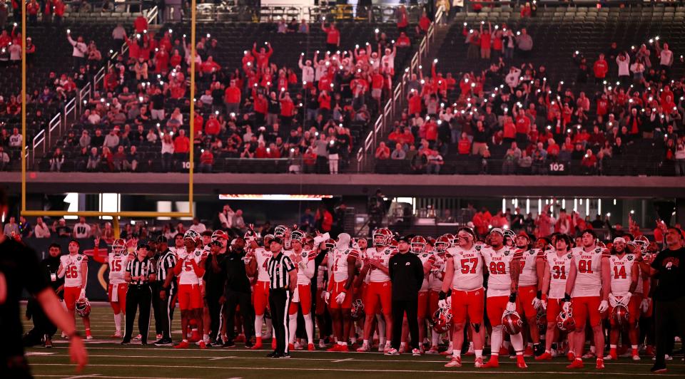 Utah Utes players and fans stand in honor of late players Ty Jordan and Aaron Lowe as Utah and Northwestern play in the SRS Distribution Las Vegas Bowl at Allegiant Stadium on Saturday, Dec. 23, 2023. Northwestern won 14-7. | Scott G Winterton, Deseret News