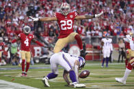 San Francisco 49ers safety Talanoa Hufanga (29) celebrates after an incomplete pass intended for Minnesota Vikings tight end Tyler Conklin, bottom, during the second half of an NFL football game in Santa Clara, Calif., Sunday, Nov. 28, 2021. (AP Photo/Jed Jacobsohn)