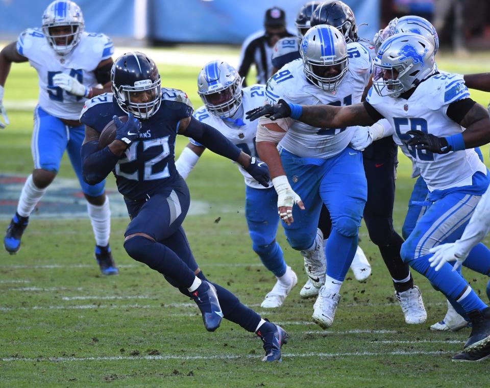 Tennessee Titans running back Derrick Henry (22) runs against the Detroit Lions on Dec. 20, 2020, during the second half at Nissan Stadium.