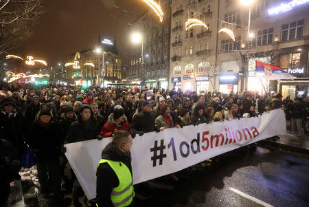 Demonstrators march during a protest against Serbian President Aleksandar Vucic and his government in central Belgrade, Serbia, January 12, 2019. REUTERS/Djordje Kojadinovic