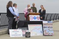 Members of environmental group speak at a press conference in Keyport N.J., on Monday, May 6, 2024, to celebrate the cancellation of a natural gas pipeline project that would have run through the bay en route to New York City. But a different project to carry liquefied natural gas through Pennsylvania and New Jersey for export to other nations is moving forward. (AP Photo/Wayne Parry)