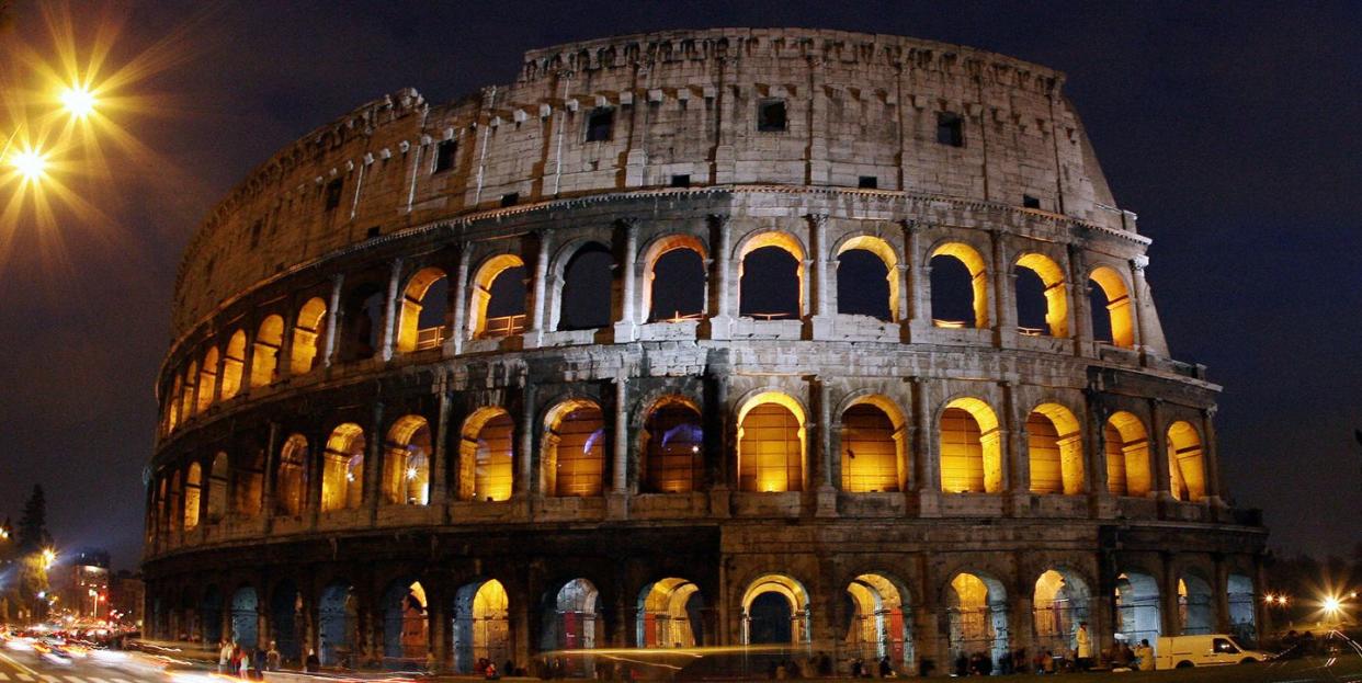 colosseum illuminated at night