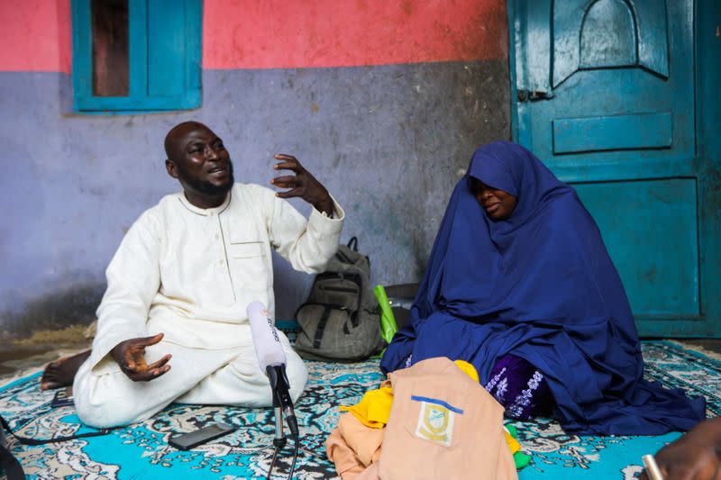 Abubakar Adam and wife, parents of seven children kidnapped at Salihu Tanko Islamic school by bandits, speak during an interview with Reuters at their house in Tegina, Niger State