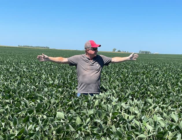 Dan Tronchetti, 66, holds his arms out to show where a proposed carbon dioxide pipeline would run through his 1,500-acre farm in Iowa, 60 miles northwest of Des Moines. (Photo: Susan Tronchetti)
