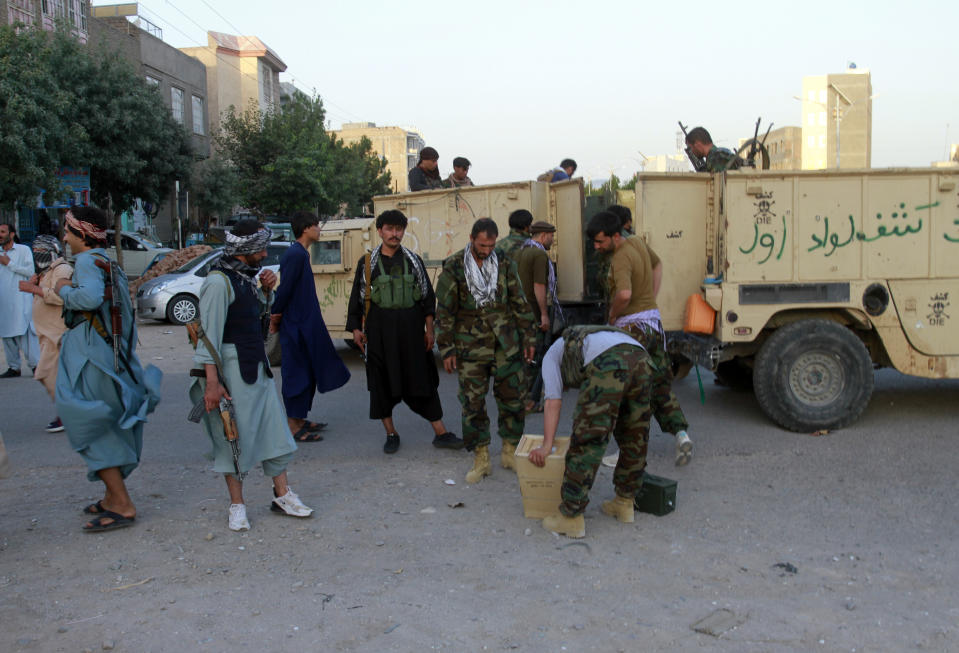 Private militia loyal to Ismail Khan, the former Mujahideen commander, patrols after security forces took back control of parts of Herat city following fighting between Taliban and Afghan security forces in Herat province, west of Kabul, Afghanistan, Friday, Aug. 6, 2021. (AP Photo/Hamed Sarfarazi)