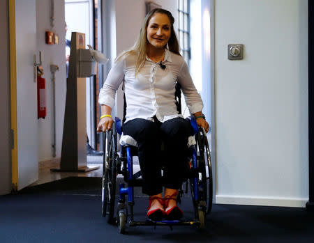 Germany's Olympic and world sprint cycling champion Kristina Vogel arrives for a news conference for the first time since being paralysed following a serious crash in training, at the Unfallkrankenhaus hospital in Berlin, Germany, September 12, 2018. REUTERS/Fabrizio Bensch