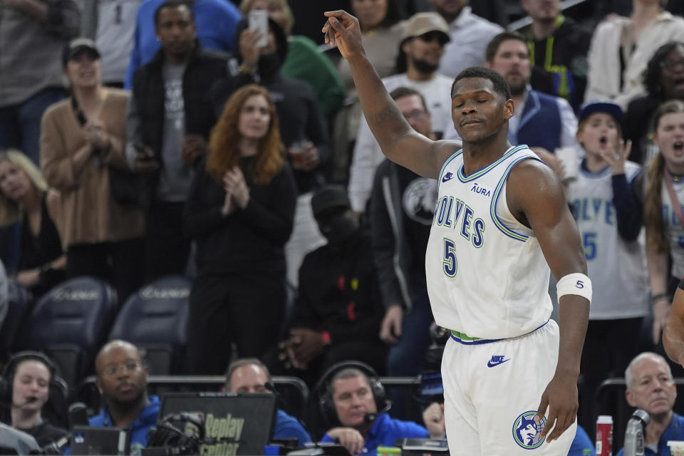 Minnesota Timberwolves guard Anthony Edwards (5) reacts after missing a shot attempt during final minute of an NBA basketball game against the Los Angeles Clippers, Sunday, March 3, 2024, in Minneapolis. (AP Photo/Abbie Parr)