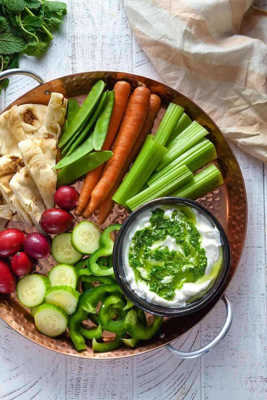 <p>Healthy Delicious</p><p>Not your basic herb dip, it gets loads of flavor from hot peppers, cilantro, and mint.</p><p><strong>Get the recipe: <a href="https://www.healthy-delicious.com/herby-greek-yogurt-dip/" rel="nofollow noopener" target="_blank" data-ylk="slk:Herby Greek Yogurt Dip;elm:context_link;itc:0;sec:content-canvas" class="link rapid-noclick-resp">Herby Greek Yogurt Dip</a></strong></p>