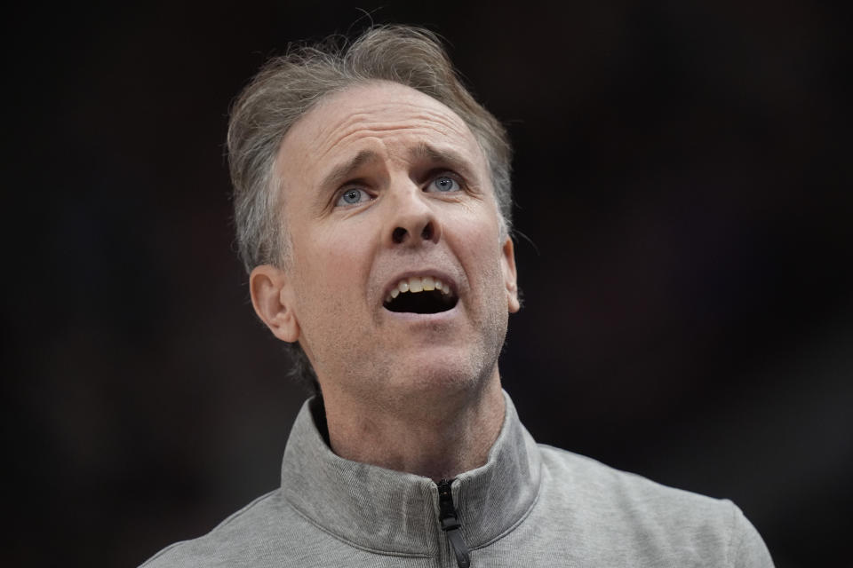 Washington Wizards interim head coach Brian Keefe looks at the scoreboard during the first half of an NBA basketball game against the Utah Jazz, Monday, March 4, 2024, in Salt Lake City. (AP Photo/Rick Bowmer)