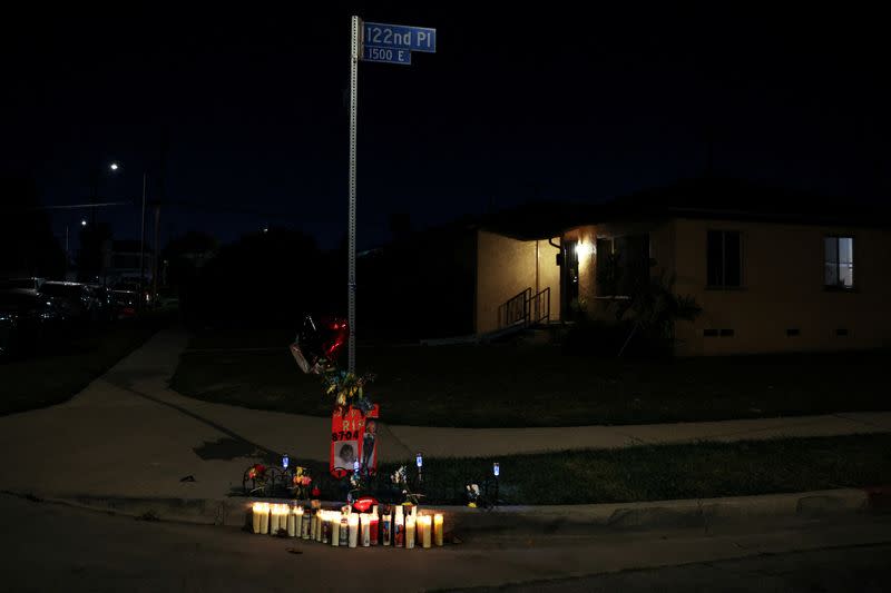 FILE PHOTO: A makeshift memorial sits at the scene of a shooting, in Los Angeles