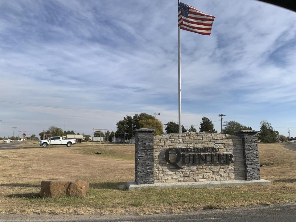 This undated photo provided by Mike Haase shows a sign welcoming people to the town of Quinter, Kansas. Quinter is the largest city in Gove County. Rural northwestern Kansas communities last week of Oct. 9, 2020, were seeing some of the state's biggest spikes in COVID-19 cases, Gove County Sheriff Allan Weber caught the virus, found himself coughing and struggling to breathe, sometimes dozens of times a day, and landed in an acute-care hospital room more than an hour from home. The pandemic arrived late, but it's now stressing the county, which has had to send patients like Weber to hospitals in other towns. (Mike Haase via AP)