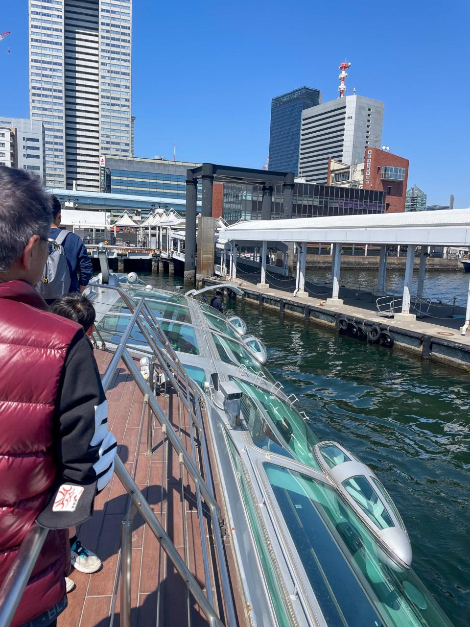 The boat pulls into the TK pier.