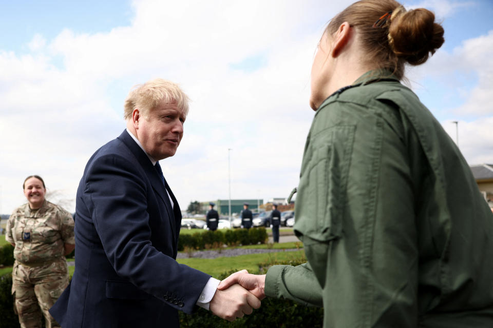 Prime Minister Boris Johnson meets troops during a visit to RAF Northolt in London. Picture date: Monday March 7, 2022.