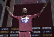 Mutaz Essa Barshim, of Qatar, gold, gestures during the medal ceremony for the men's high jump at the World Athletics Championships in Doha, Qatar, Saturday, Oct. 5, 2019. (AP Photo/Nariman El-Mofty)