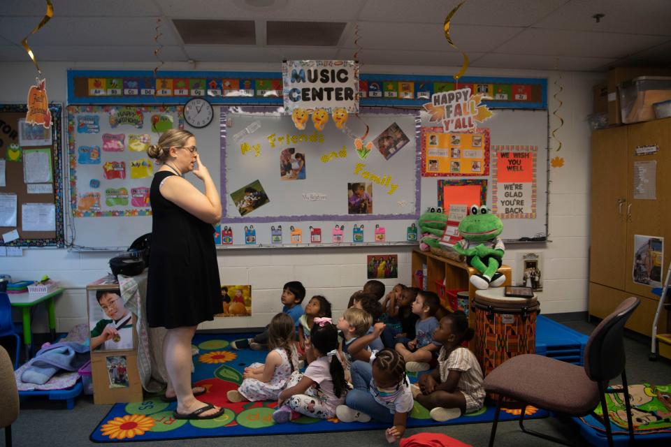 Alyssa Garnett gathers the children during circle time at St. Mary Villa Child Development Center in Nashville, Tenn., Monday, Sept. 25, 2023.