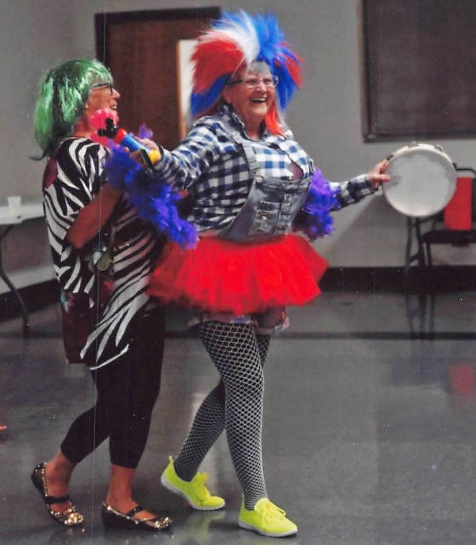 Johnette “Inky” Eckstine celebrates her 80th birthday decked out in one of her wild costumes with encouragement from niece Susan Vinzant.