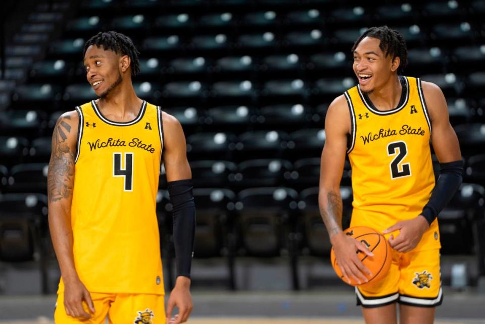 Wichita State Men’s Basketball players Colby Rogers, left, and Jalen Ricks, right, laugh at a teammate during media day.