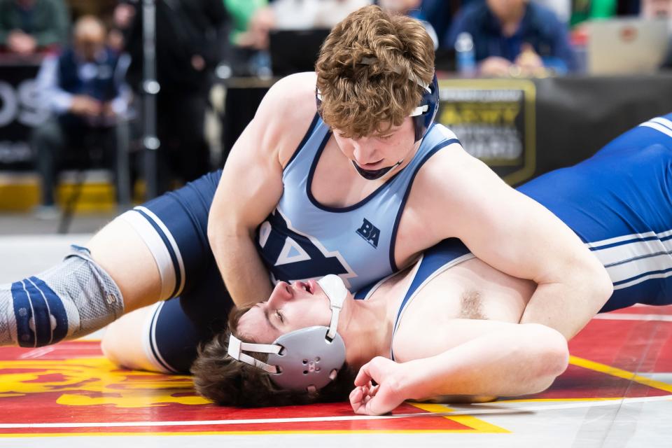 Central Valley's Brenan Morgan pins Penns Valley's Kollin Brungart in 45 seconds during a 215-pound first round bout at the PIAA Class 2A Wrestling Championships at the Giant Center on March 9, 2023, in Derry Township.