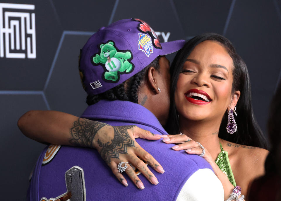 ASAP Rocky and Rihanna pose for a picture as they celebrate her beauty brands Fenty Beauty and Fenty Skinat Goya Studios on February 11, 2022 in Los Angeles, California.