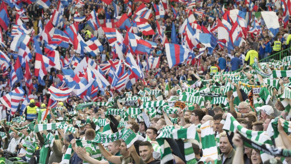 Celtic and Rangers fans at the start of the Scottish Premiership match between Celtic and Rangers at Celtic Park on September 10, 2016 in Glasgow. - Steve Welsh/Getty Images