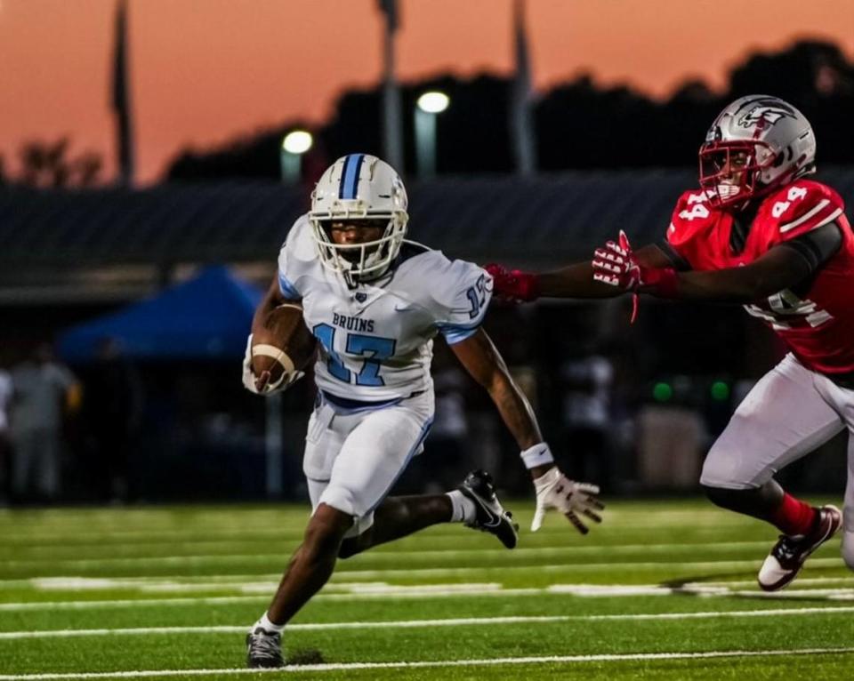 South Florence High School’s Jayden Sellers runs with the football. The junior recently committed to the University of South Carolina.