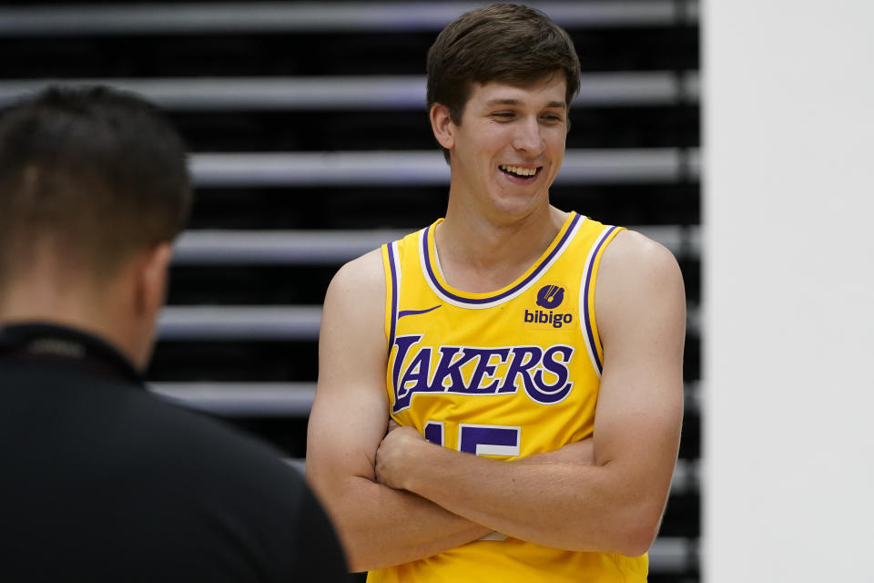 Los Angeles Lakers guard Austin Reaves poses for photos during the NBA basketball team's media day, Monday, Oct. 2, 2023, in El Segundo, Calif. (AP Photo/Ryan Sun)